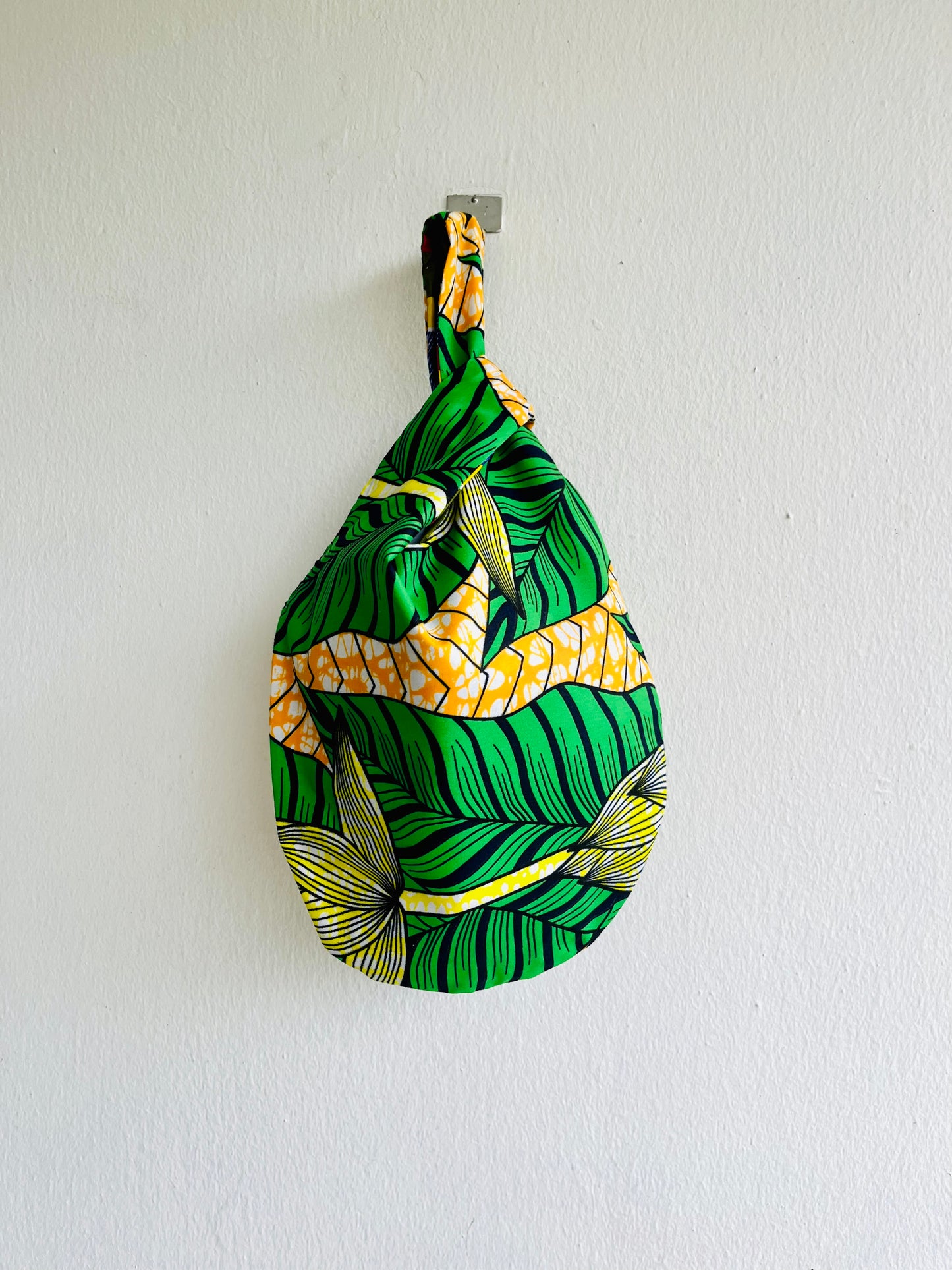 Origami reversible knot bag , fabric wrist colorful bag , African fabric bag | The trees of Africa - Jiakuma