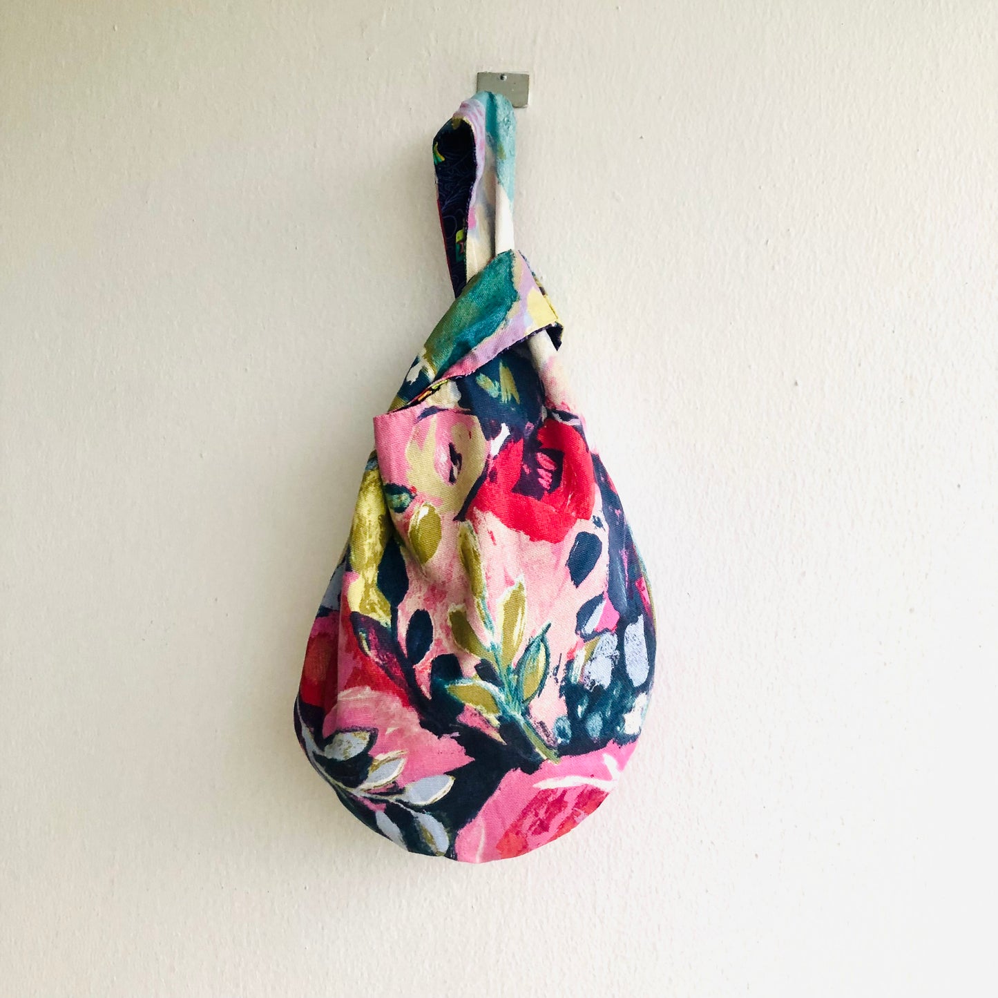 Knot Japanese inspired bag , small origami fabric bag , reversible wrist bag | Alice swimming in a pool of tears - Jiakuma