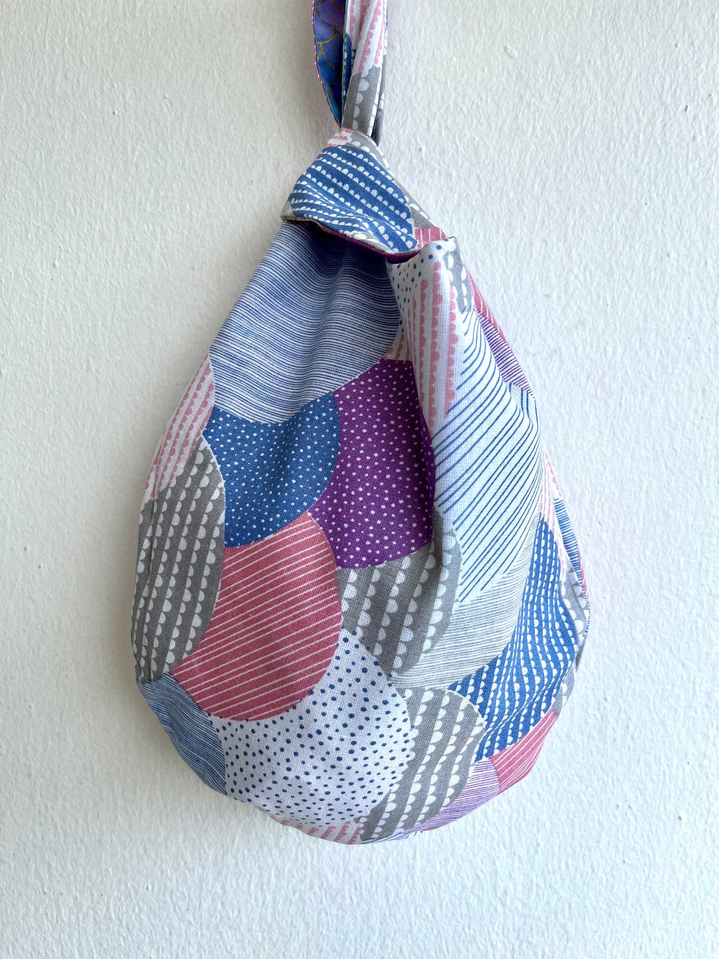 Small origami knot bag , wrist Japanese inspired bag , reversible fabric bag | Arcoiris - Jiakuma