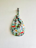 Origami knot bag , small wrist bag , Japanese Inspired fabric bag , reversible colorful bag | Sun bathing and chilling in Hokkaido