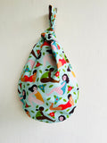 Origami knot bag , small wrist bag , Japanese Inspired fabric bag , reversible colorful bag | Sun bathing and chilling in Hokkaido