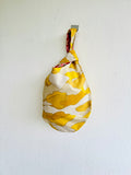 Origami knot bag , fabric colourful small bag  reversible wrist Japanese inspired handmade bag | Yellow and gold sand dunes