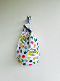 Origami knot bag , Japanese inspired fabric bag . reversible wrist bag , small lunch bag | Strokes & beans