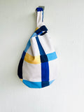 Origami knot bag , Japanese inspired fabric bag . reversible wrist bag , small lunch bag | Strokes & beans