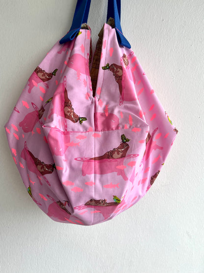 Mariko sac bag | The hippo & the butterfly swimming away from the yellow city landscape - Jiakuma