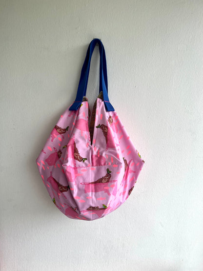Mariko sac bag | The hippo & the butterfly swimming away from the yellow city landscape - Jiakuma