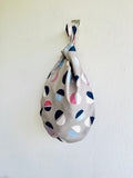 Origami knot bag , reversible fabric small bag , wrist Japanese inspired eco friendly bag , cute weekend bag | Going round