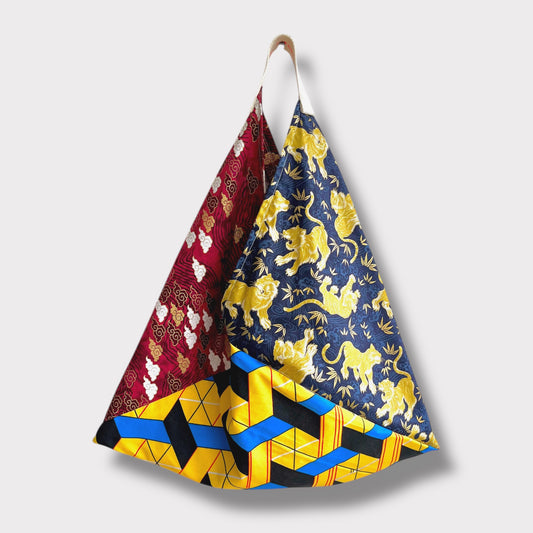 Bento bag | Golden dragons flying over the Japanese weaves on their way to Africa - Jiakuma