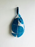 Origami knot bag , reversible fabric bag , wrist Japanese inspired bag , cute small bag | Blue prints