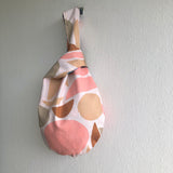 Small wrist origami bag , reversible Japanese inspired knot bag | Contemporary palette