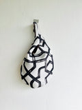 Small origami knot bag , reversible Japanese inspired wrist bag , handmade one of a kind bag | Watercolor brushstrokes