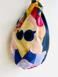 Origami knot bag , wrist Japanese inspired bag , reversible colorful summer bag | Travelling to Mykonos