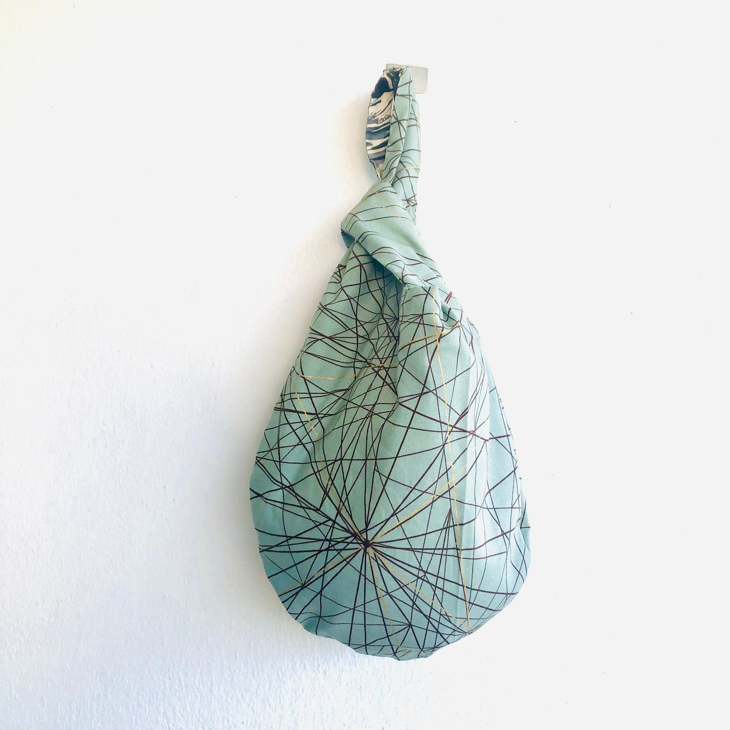 Wrist fabric bag , small cute Japanese inspired knot bag | Waves & infinite horizons