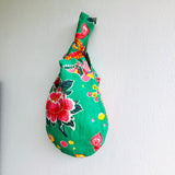 Reversible wrist small bag , knot fabric handmade bag | Peacocks walking through a rose flowers garden