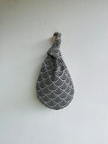 Origami knot bag , Japanese fabric reversible bag , wrist small weekend bag | Space invaders landing in Japan