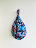 Small wrist bag , origami reversible knot bag , Japanese inspired fabric bag | Northern lights