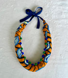 Colorful statement necklace , African fabric bold necklace , one of a kind colorful handmade Jewelry | African shells and pom poms