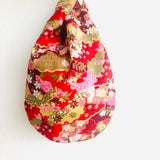 Knot Japanese inspired bag , wrist small origami bag , fabric reversible cute bag | Cranes flying towards a beautiful red & golden garden