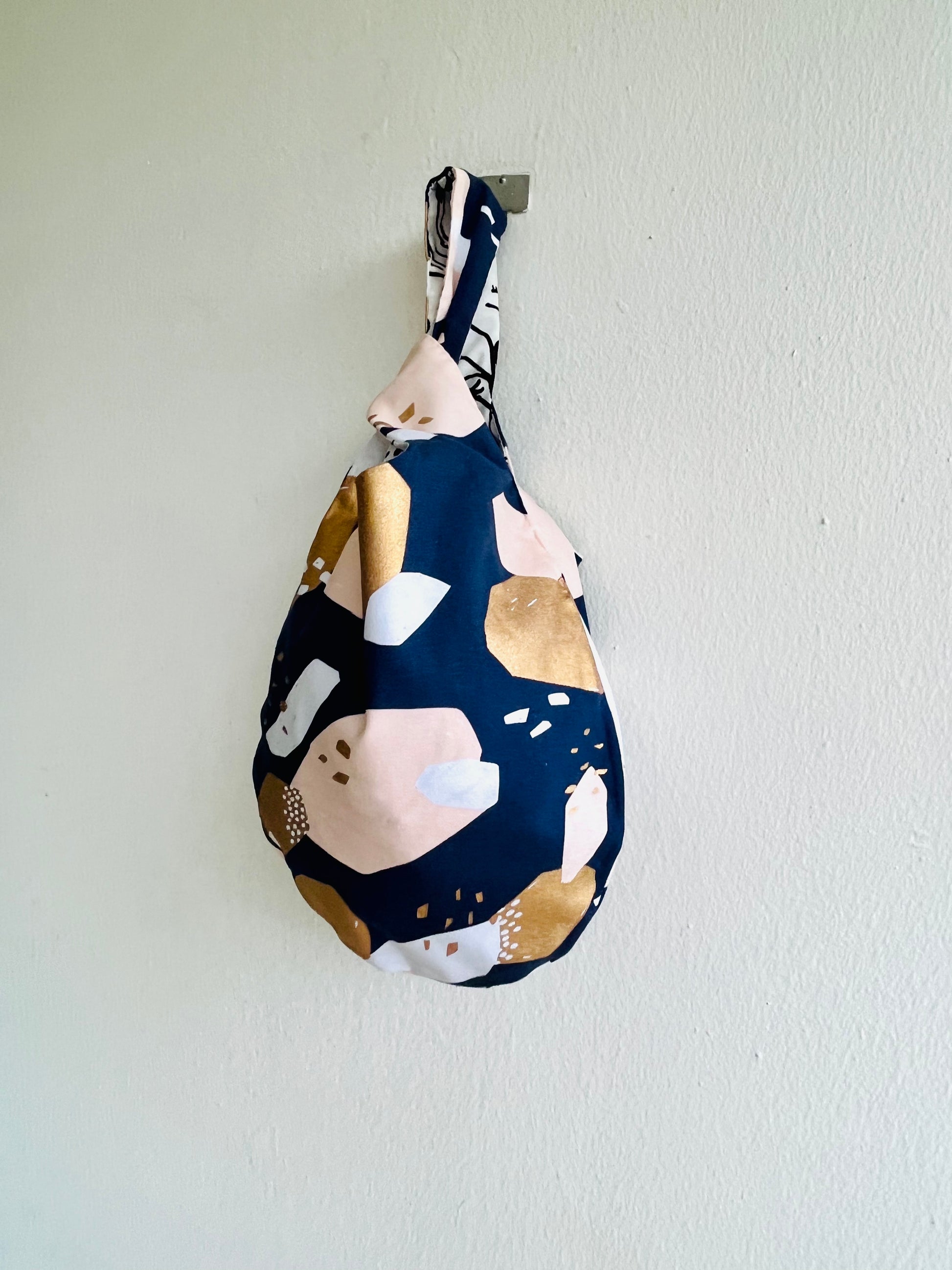 Origami small bag , knot Japanese fabric bag , colorful reversible wrist bag | Golden strokes city landscape - Jiakuma