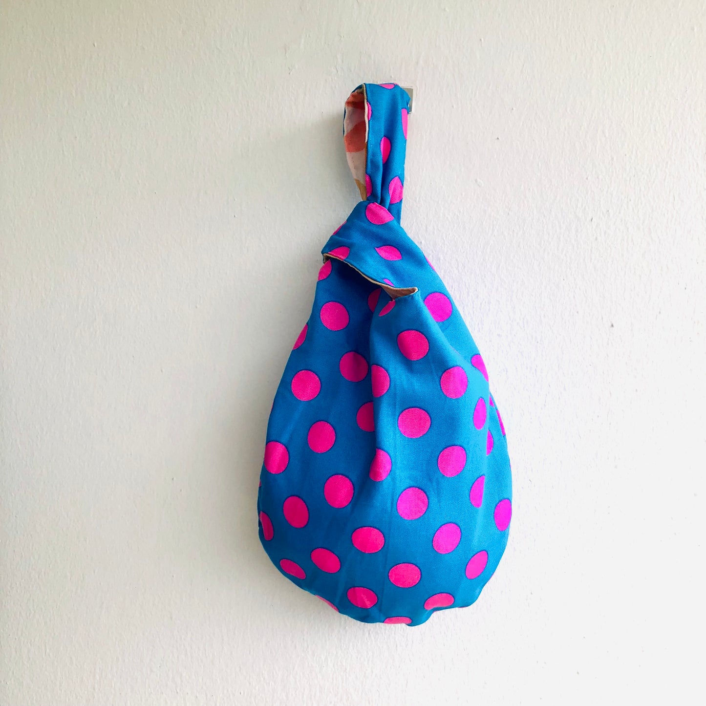 Small wrist origami bag , reversible Japanese inspired knot bag | Contemporary palette