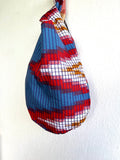 Small wrist bag , origami Japanese inspired knot bag , reversible fabric bag | Modern & traditional geometries