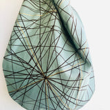 Wrist fabric bag , small cute Japanese inspired knot bag | Waves & infinite horizons