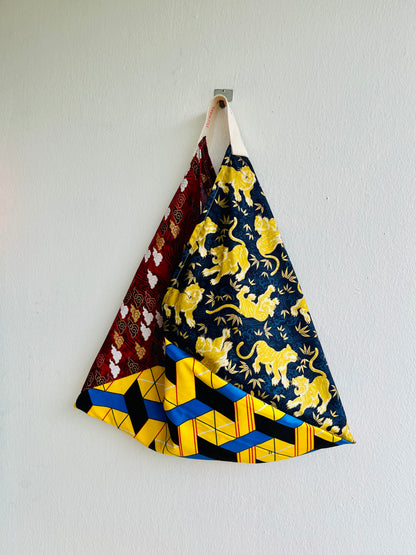 Bento bag | Golden dragons flying over the Japanese weaves on their way to Africa - Jiakuma