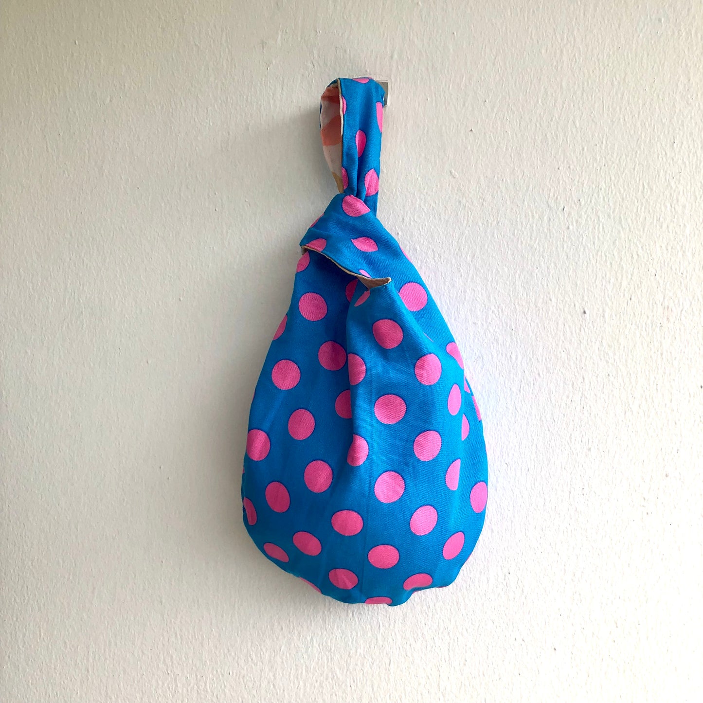 Small wrist origami bag , reversible Japanese inspired knot bag | Contemporary palette