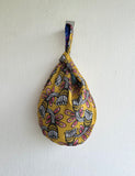 Original small knot bag , reversible wrist bag , eco friendly Japanese inspired bag | Fossils in my garden