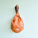 Origam knot bag , small wrist fabric bag , reversible cute Japanese bag , handmade gift idea | The faces of the desert