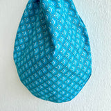 Origami small bag , Japanese inspired wrist bag , knot fabric bag | Blue waves with gold sparkles
