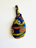 Colorful Japanese inspired African fabric bag , knot wrist bag , reversible eco friendly cool bag | The happy colors of Africa