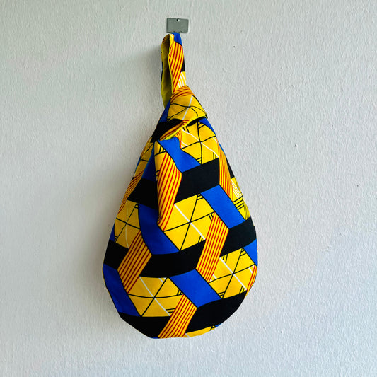 Origami knot bag, small Japanese inspired wrist bag , colorful African reversible bag | Amarillo Africa - Jiakuma