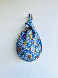 Origami small knot bag , wrist Japanese inspired bag , reversible fabric cute bag | Blue flowers swimming over the sea at night