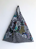 Origami bento shoulder bag, reusable shopping eco handmade bag | Faces of the world - Jiakuma