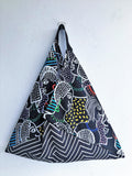 Origami bento shoulder bag, reusable shopping eco handmade bag | Faces of the world - Jiakuma